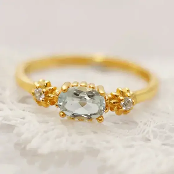 Ring zilver verguld hemels blauw topaas