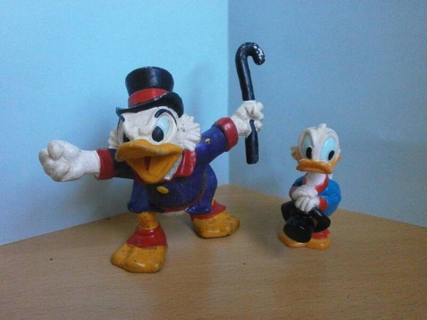 2 figurines picsou , 1 bully , et 1 sans marque , occasion