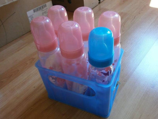 6 biberons + panier , neuf