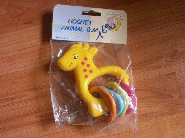 hochet girafe jaune en plastique , neuf