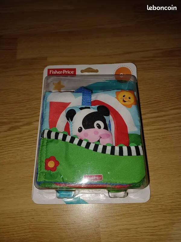 petit livre en tissus fischer price , neuf