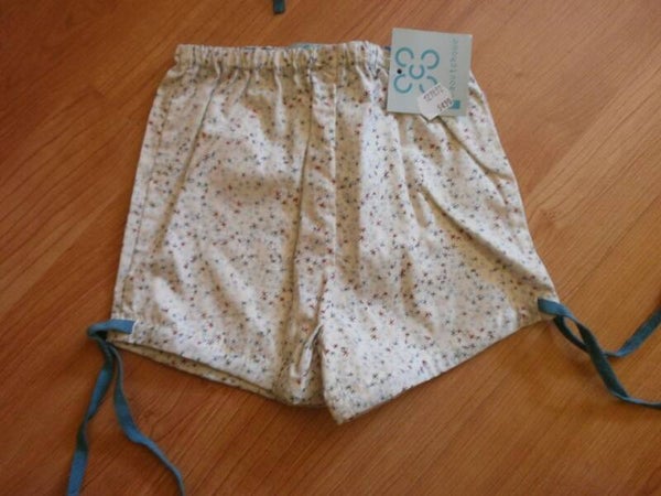 short ou culotte pour bebe, rose , marque caoutchouc , 3 ou 6 mois au choix , neuf