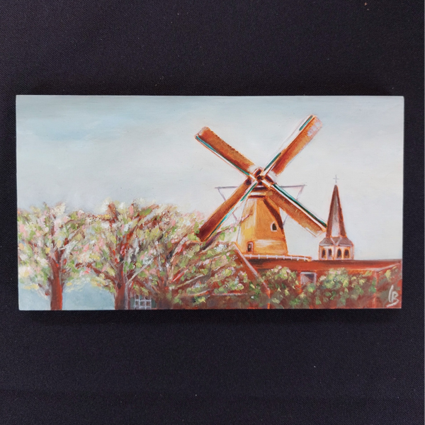 Windmill with church