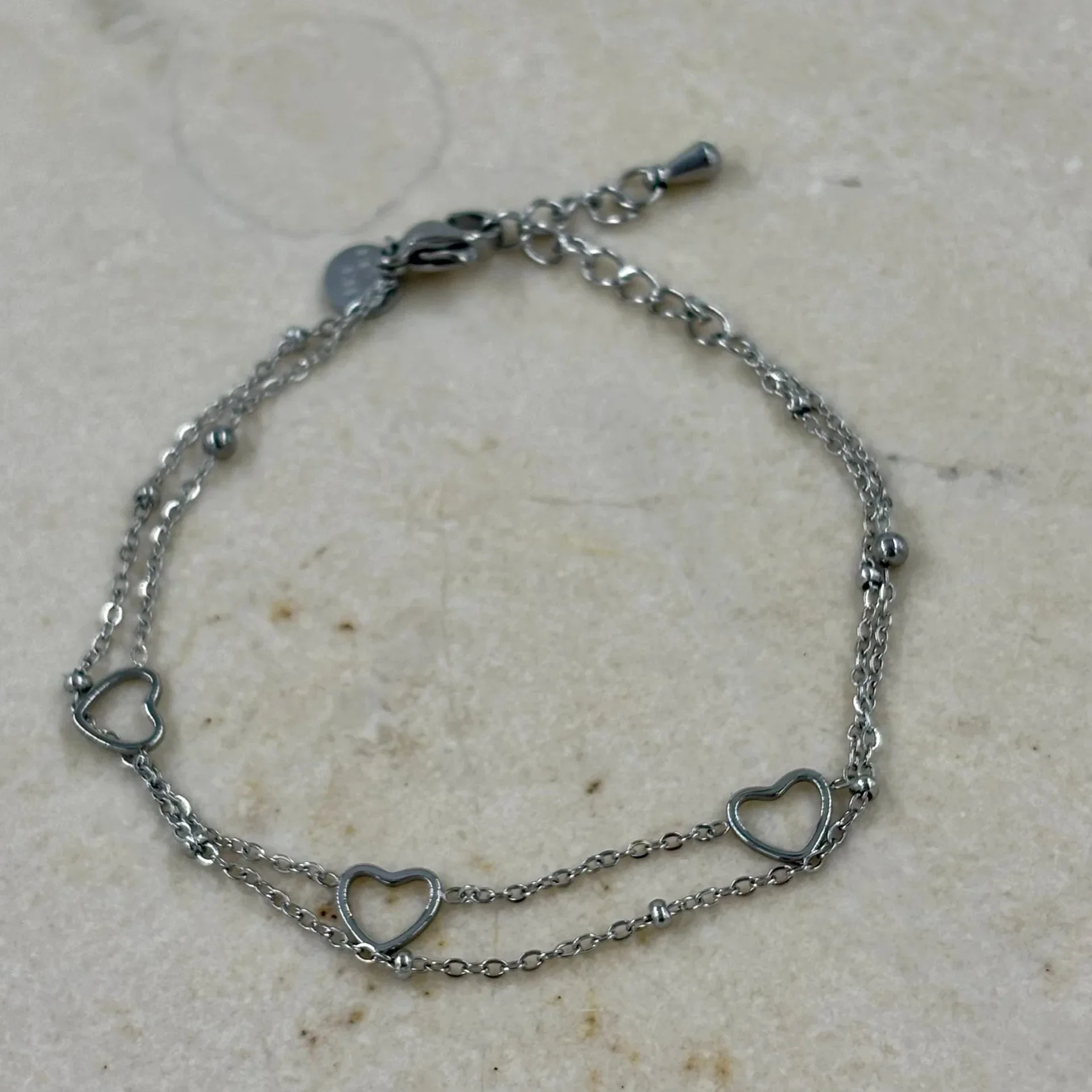 Dubbele armband open hartjes