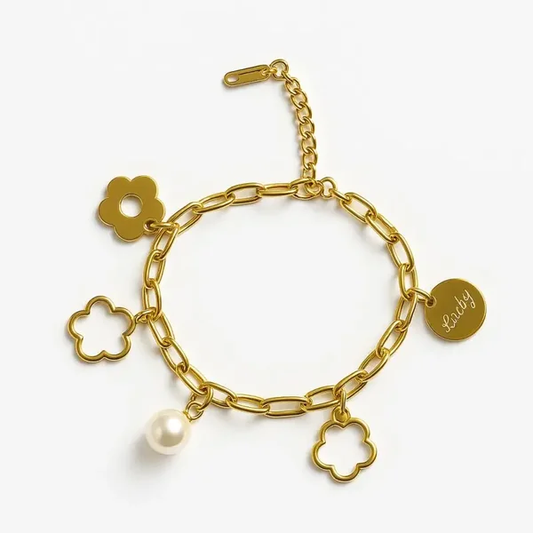Goude bloem en parel armbandje