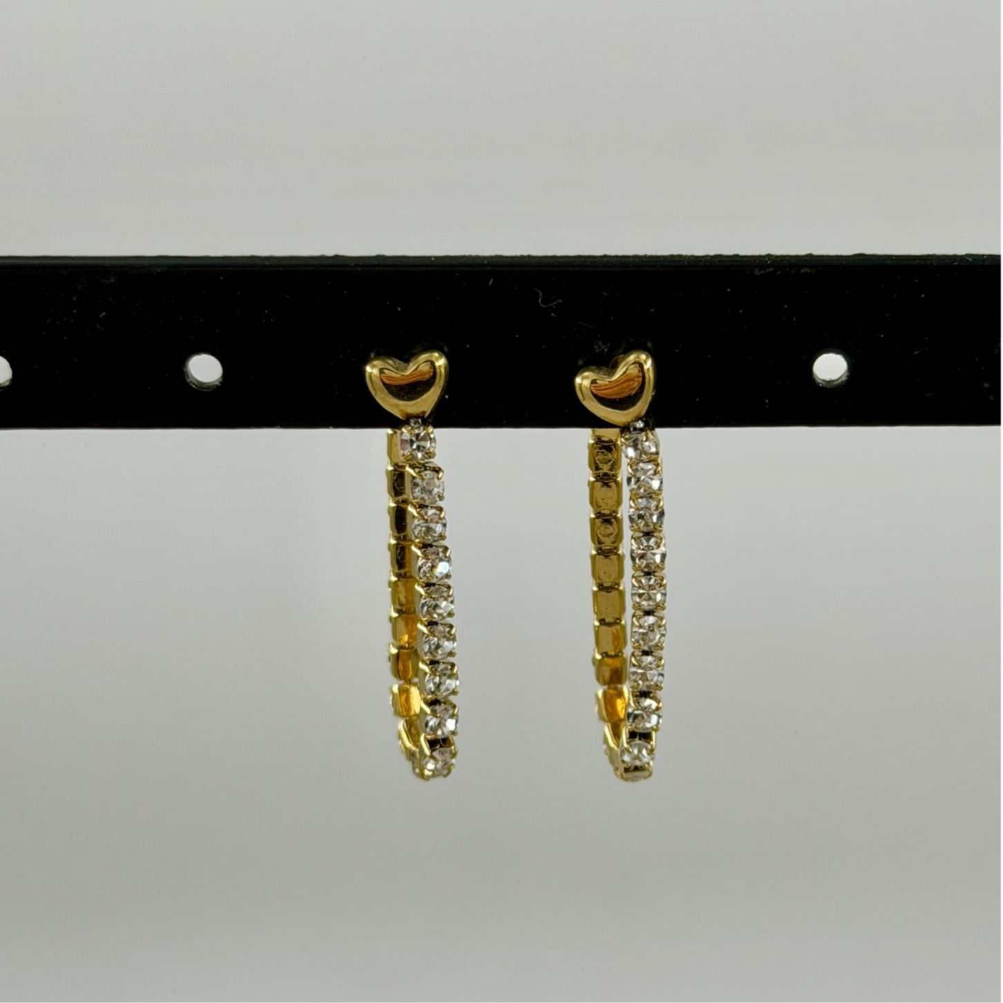 Goudkleurige oorbellen met kettingdetail