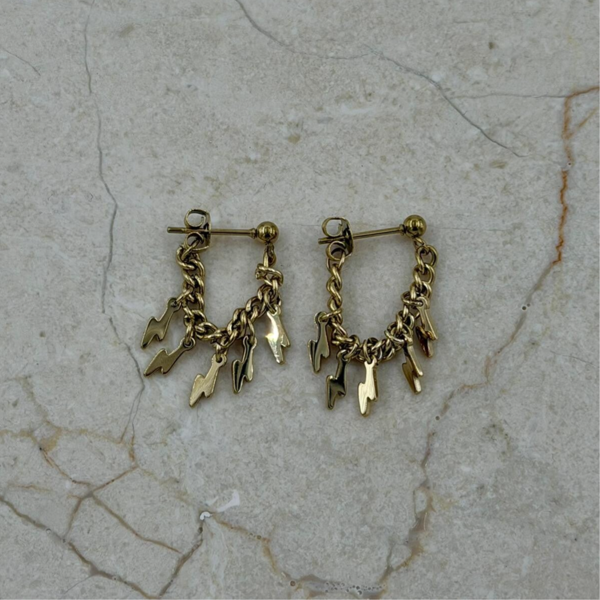 Oorbellen ketting met bliksem