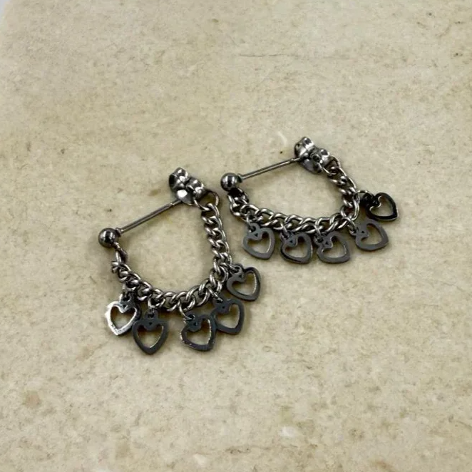 Oorbellen ketting met kleine hartjes