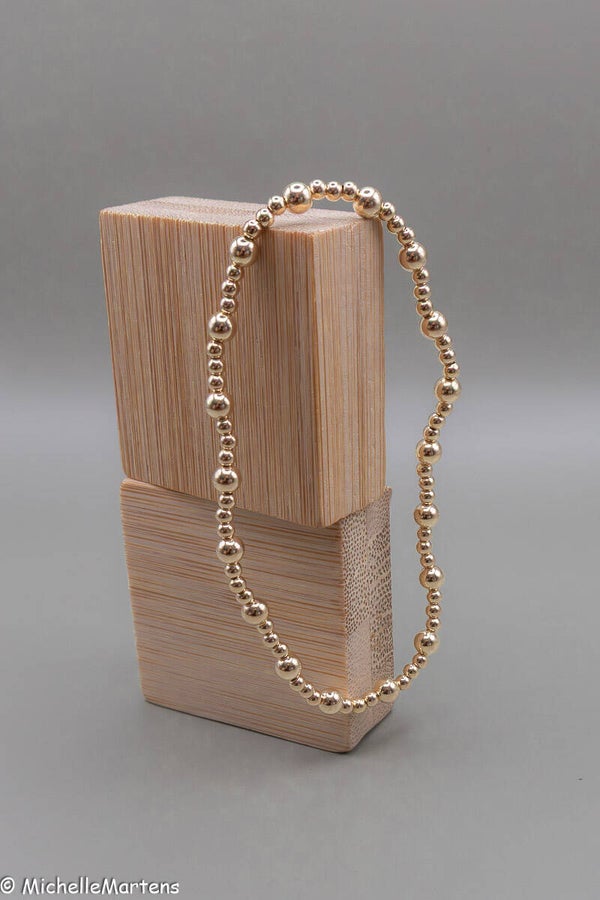 DOTS 2,5mm armband met 4mm dots tussendoor.