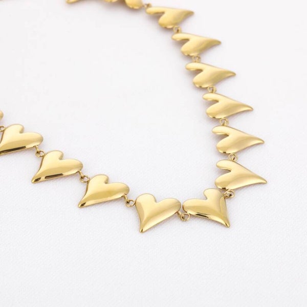 Lots of hearts ketting goud