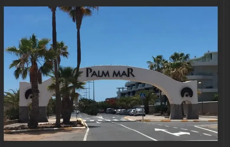 Entrance arch of Palm Mar tourist area and marine reserve