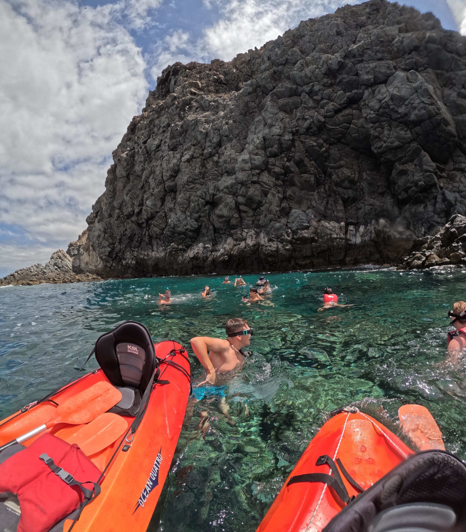 snorkeling in front of the pink cave of palm mar