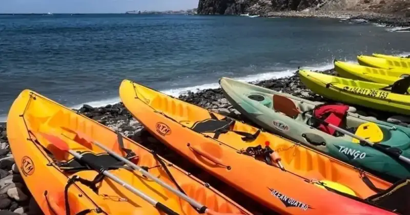 kayaks resting on the sand ready for the excursion
