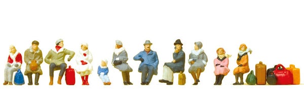 Preiser 10317 Sitzende Reisende winterliche Kleidung