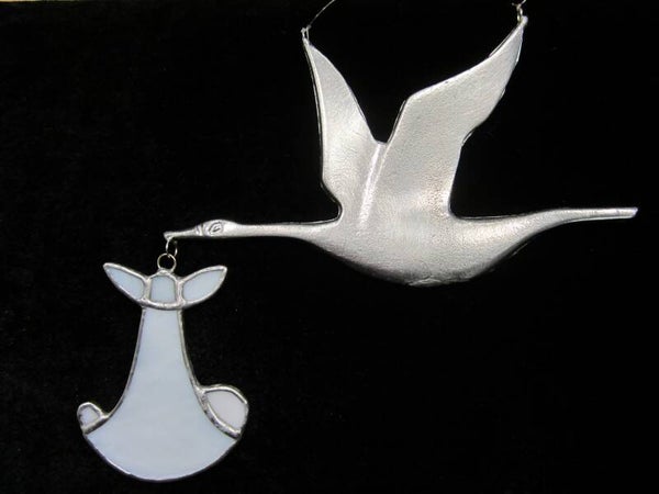 Ooievaar met baby - wit