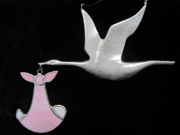 Ooievaar met baby - rose