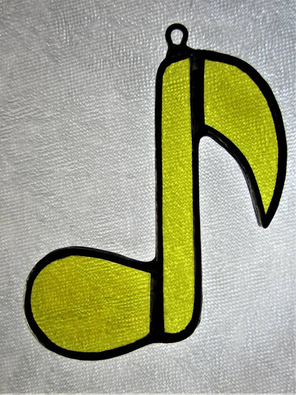 Muzieknoot geel
