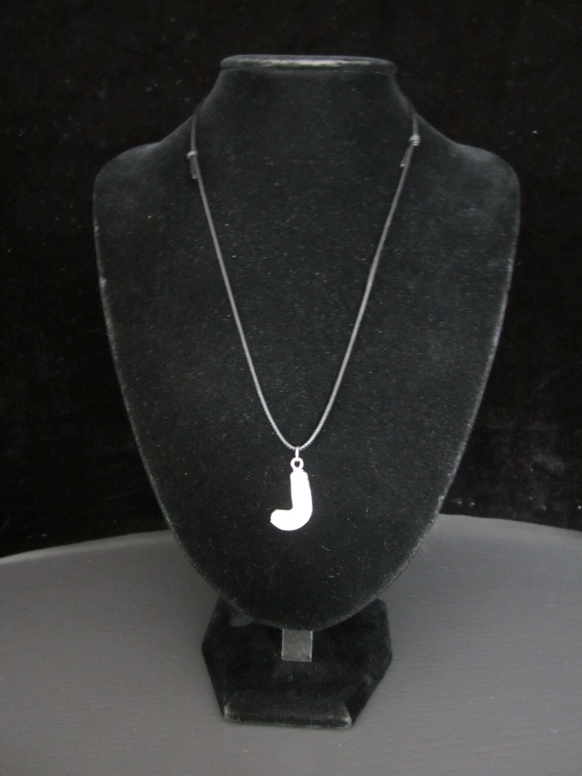 Letterhanger J van zilvertin