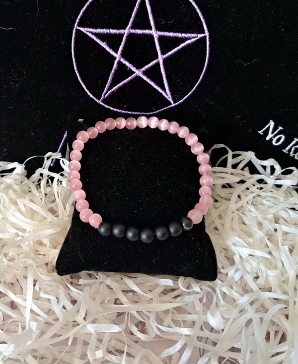 Pulsera de ojo de gato rosa con onix