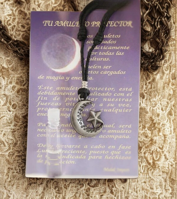 Amuleto luna sol con aceite protector