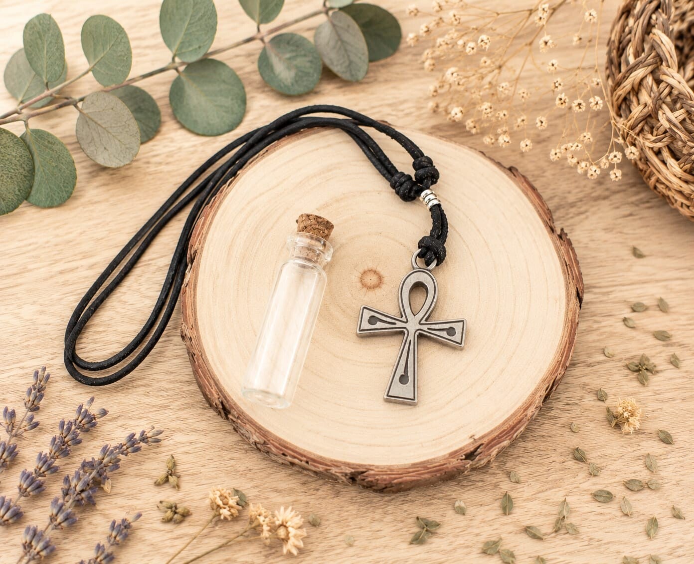 Amuleto cruz egipcia con aceite protector