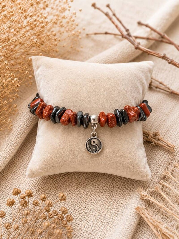 Pulsera nácar tintado y goldstone con símbolo yin yang