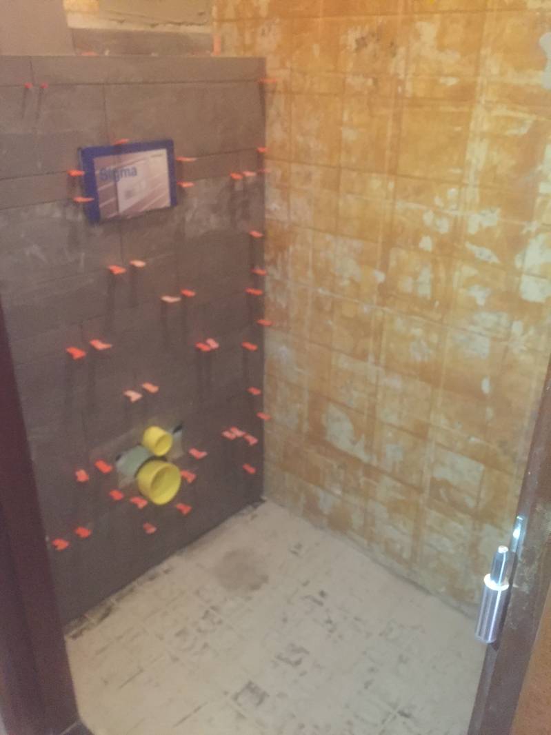 zetten tegels sanitair