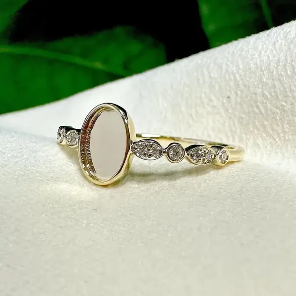 Gold breastmilk, Ash oval ring.