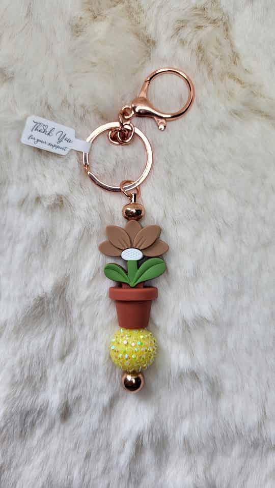 Sleutelhanger Bloempot rhinestone geel