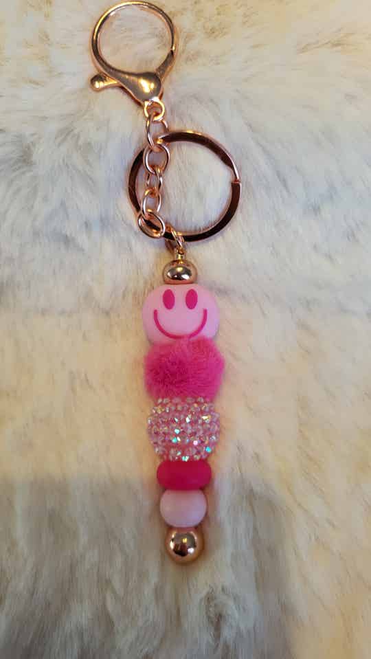 Sleutelhanger roze smiley