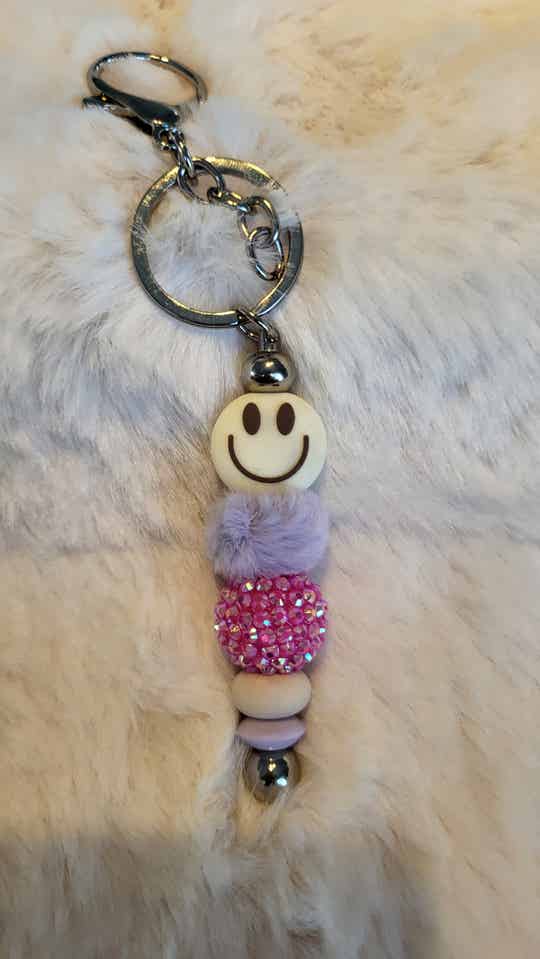 Sleutelhanger beige smiley
