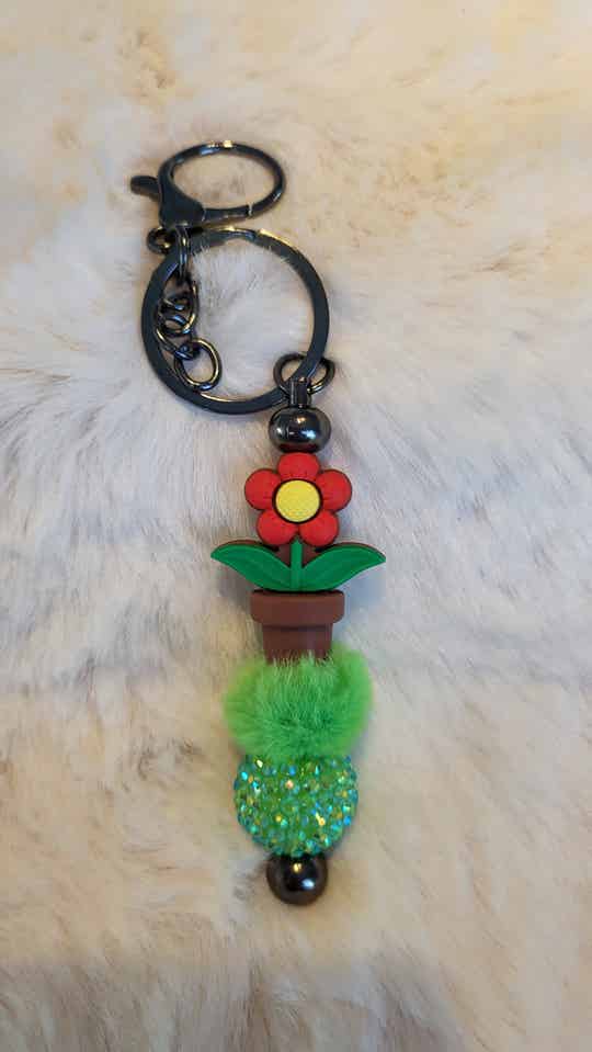 Sleutelhanger rooie bloem in pot