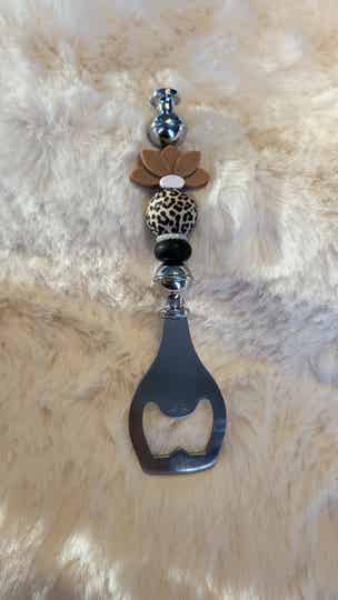 Flessenopener bloem panter