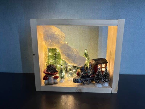 Kerstkader met rood treintje