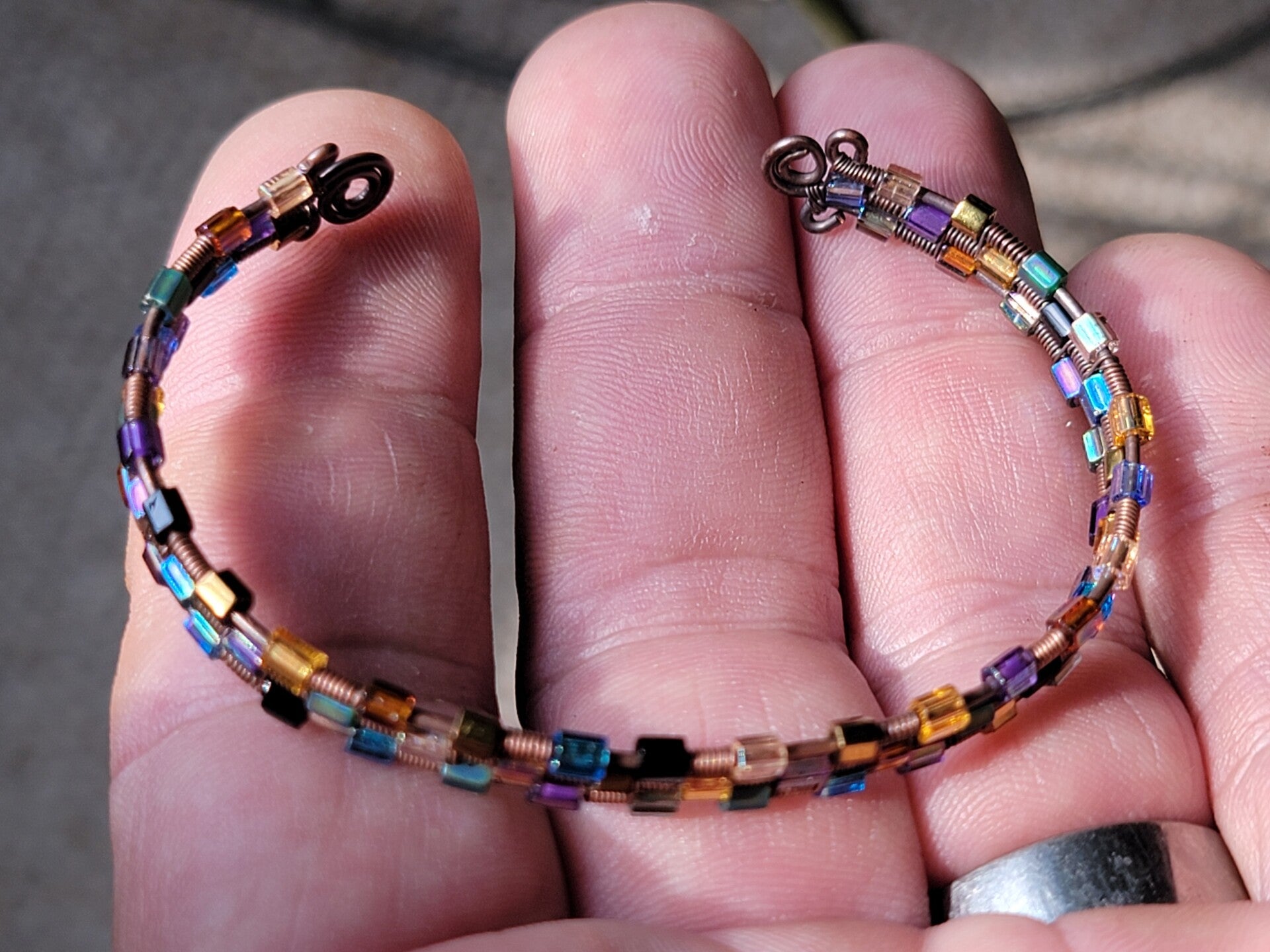 Copper Wire Wrapped Bracelet with Multi Colored Glass Beads.