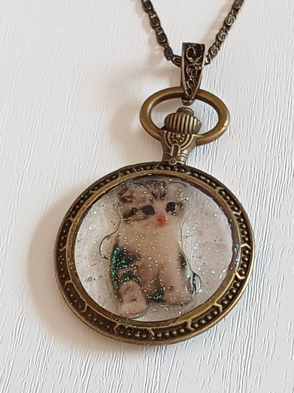 Colgante cat on time