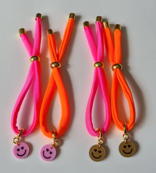 AANTREKARMBAND *smiley neon
