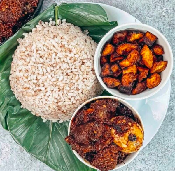 Ofada rice with plantain and iyamse