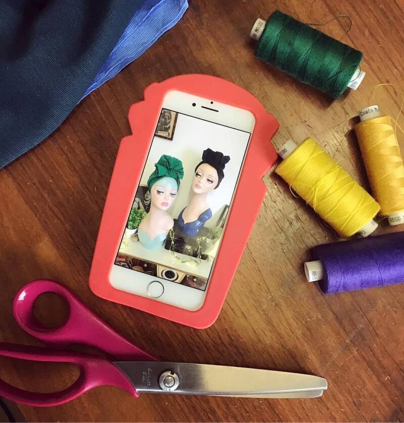 iphone surrounded by sewing equipment showing digital marking image