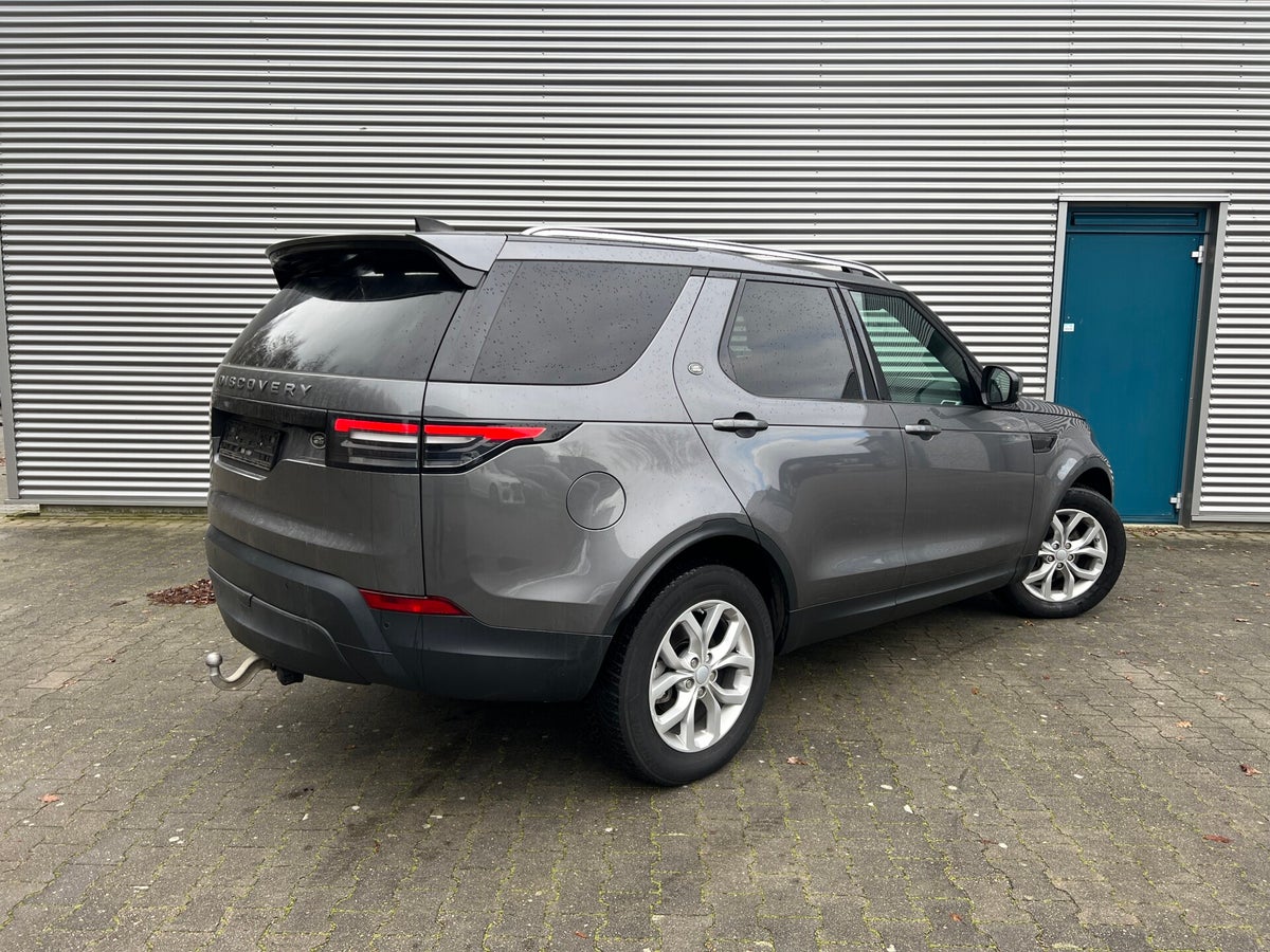 Land Rover Discovery van geel naar grijskenteken