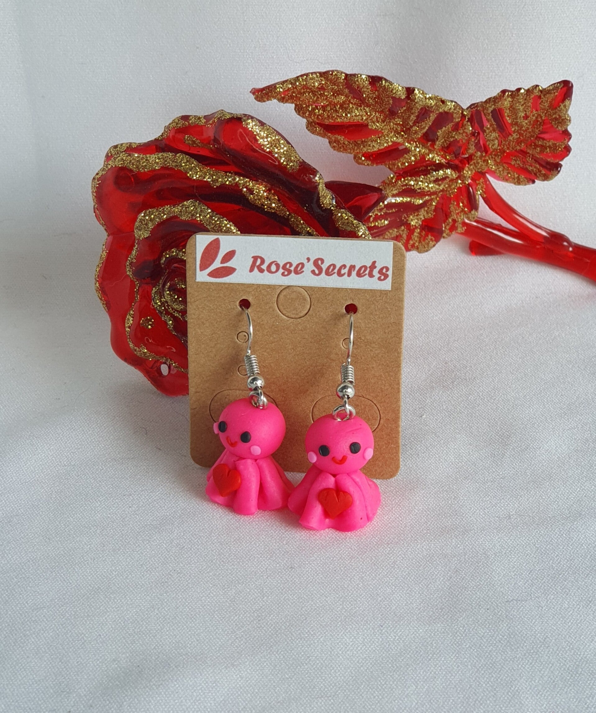 Boucles d'oreille fantôme rose