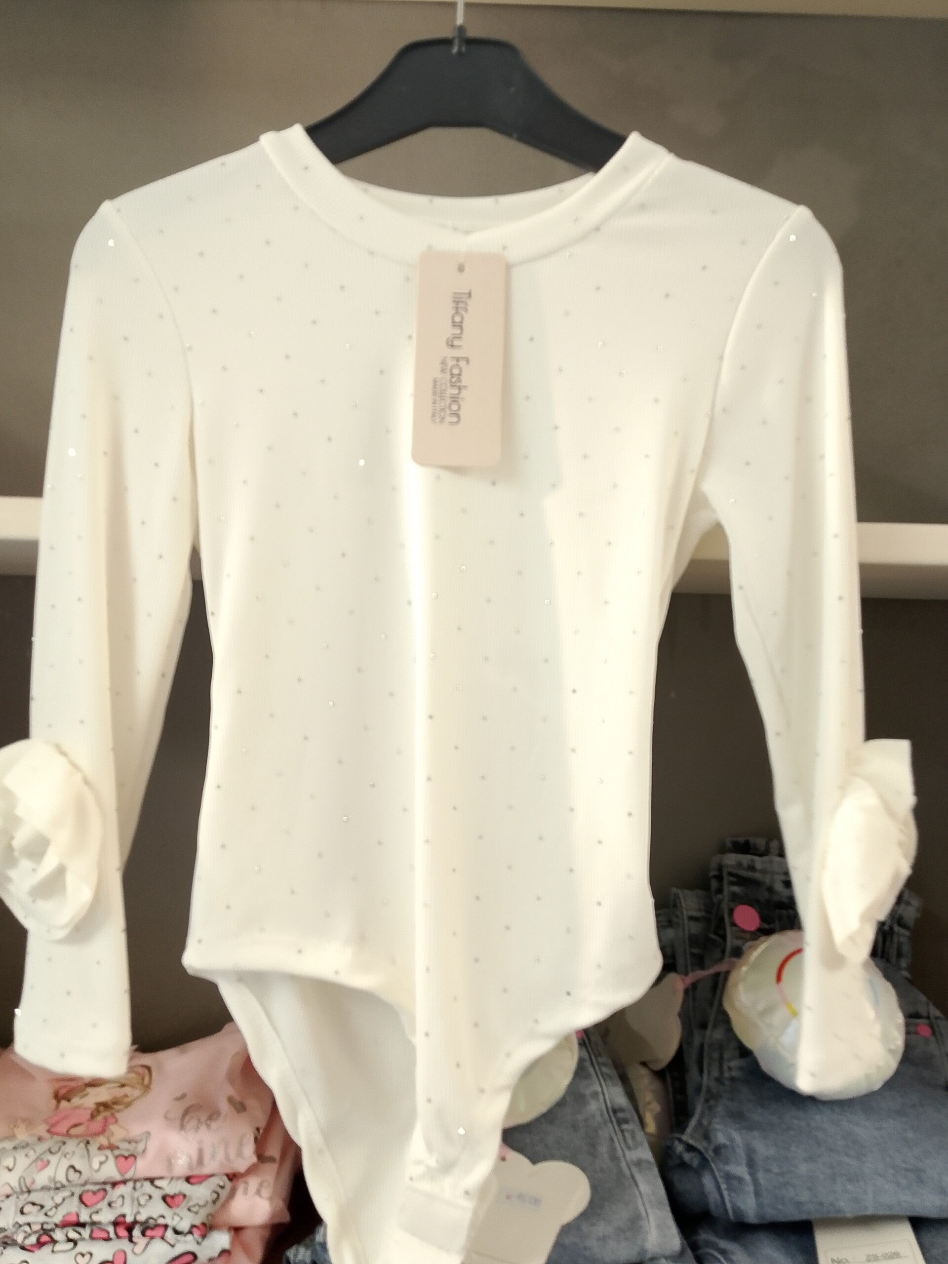 Body luccicante con rose