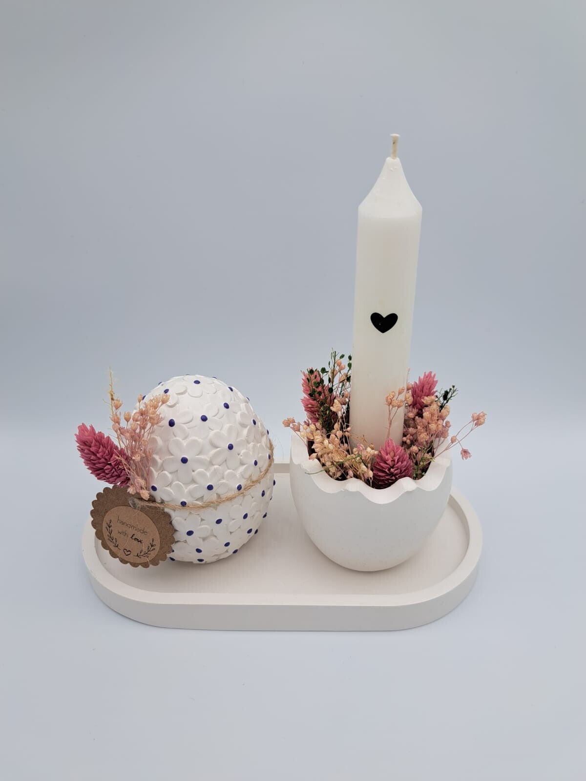 Ostergesteck mit weisser Kerze