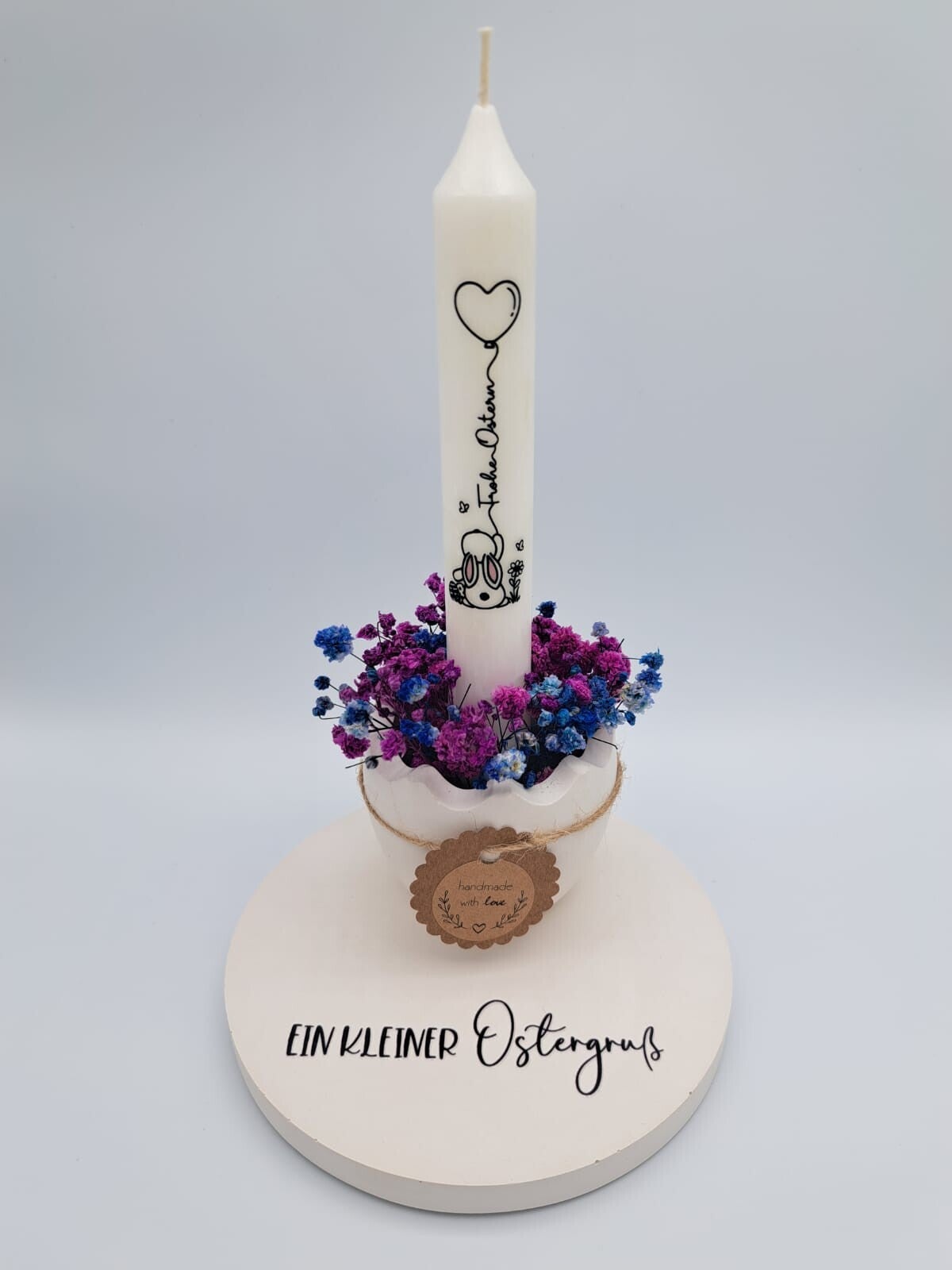 Ostergesteck mit weisser Kerze