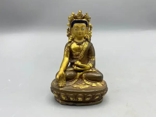 Vintage Goldface Boeddha in varada mudra uit Nepal 8,5 cm