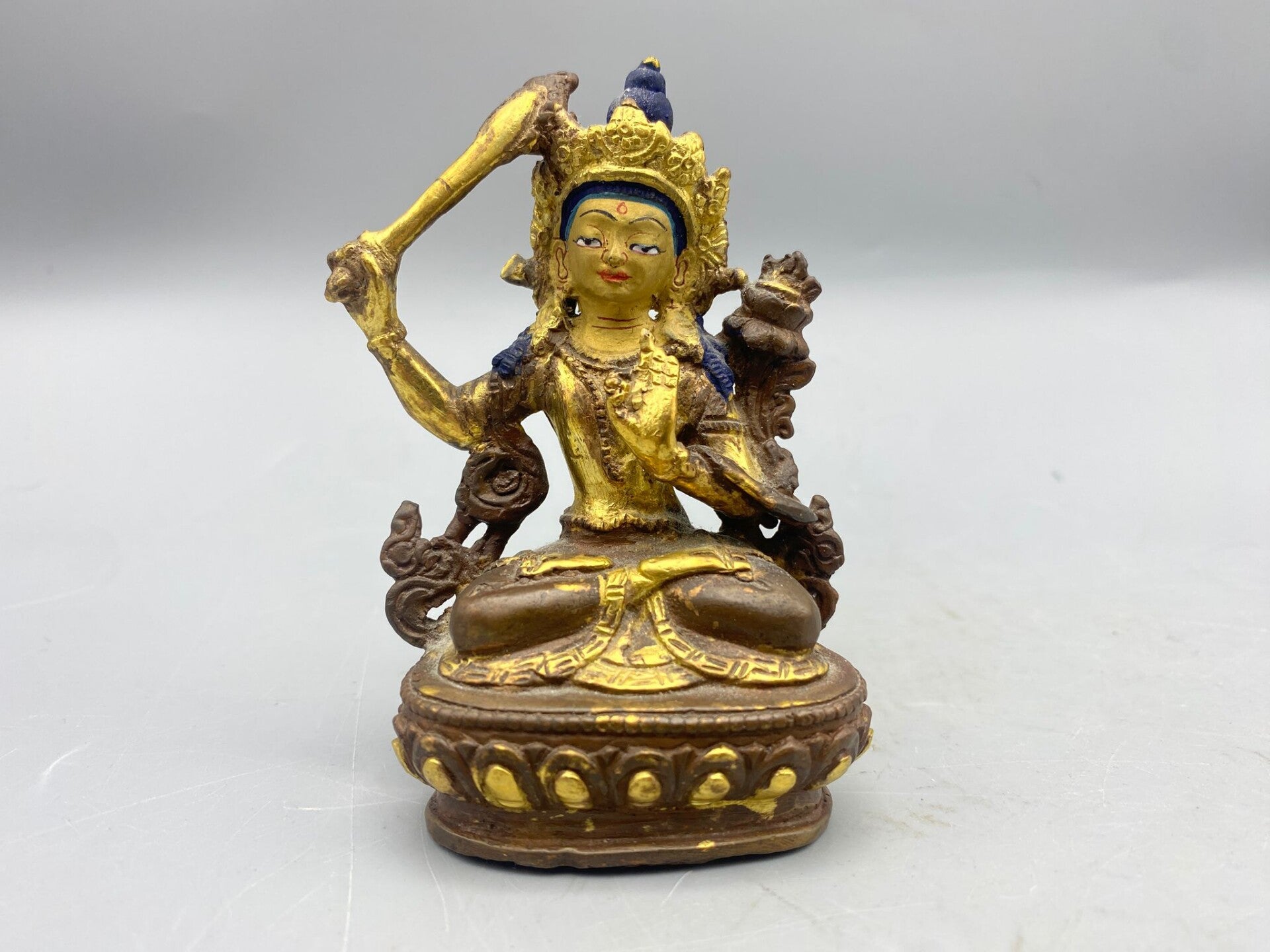 Vintage Goldface Manjushri beeld uit Nepal 9,5 cm