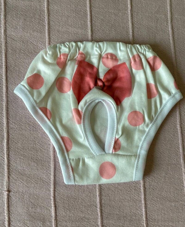 Braguita de lunares rosa con lazo fucsia