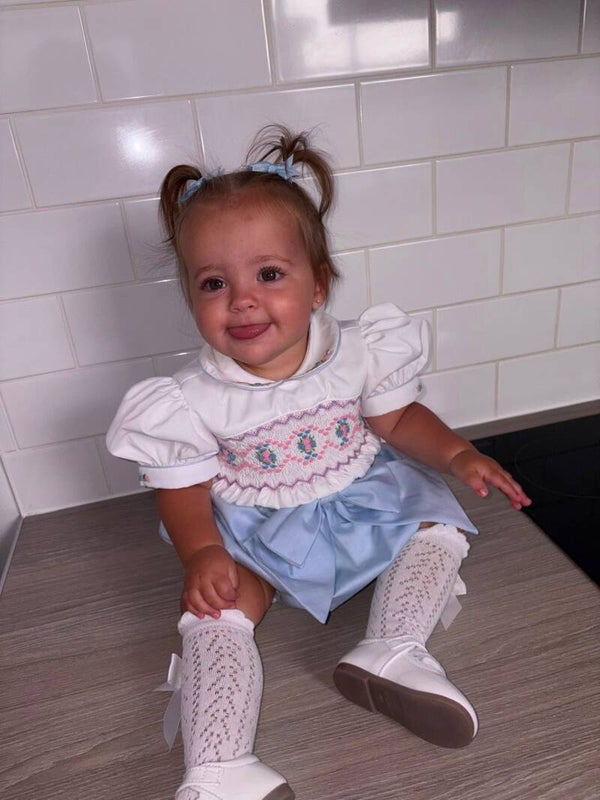 Light blue smocked romper