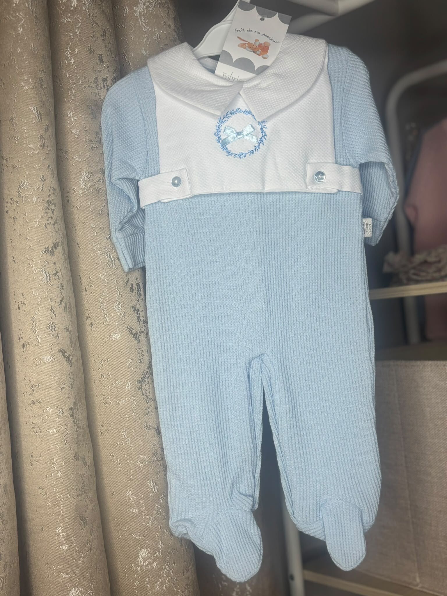 Baby blue sleepsuit