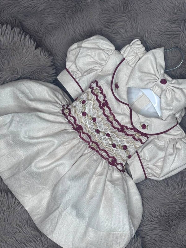 Stunning champagne smock dress with red detailing